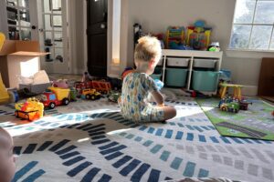 A boy playing with toys