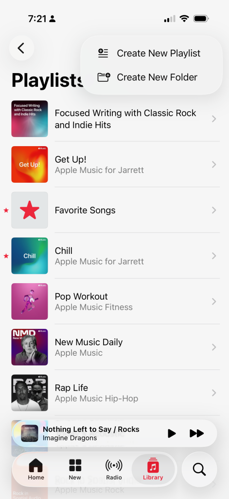 Screenshot of a music app playlist screen with options to create new playlists or folders.