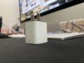 Apple Might Not Include iPhone Charger with 2020 iPhone - Could This Be A Great Move? 2 5-watt iPhone Charger in front of an iMac