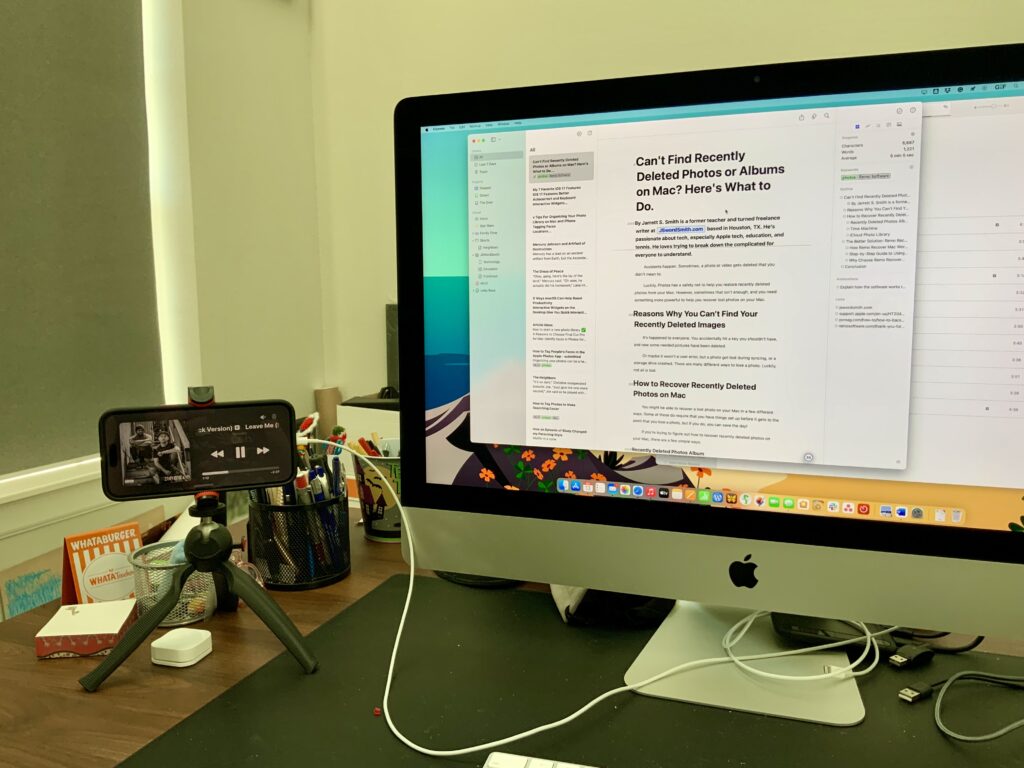 My 8 Favorite iOS 17 Features 11 StandBy mode next to an iMac