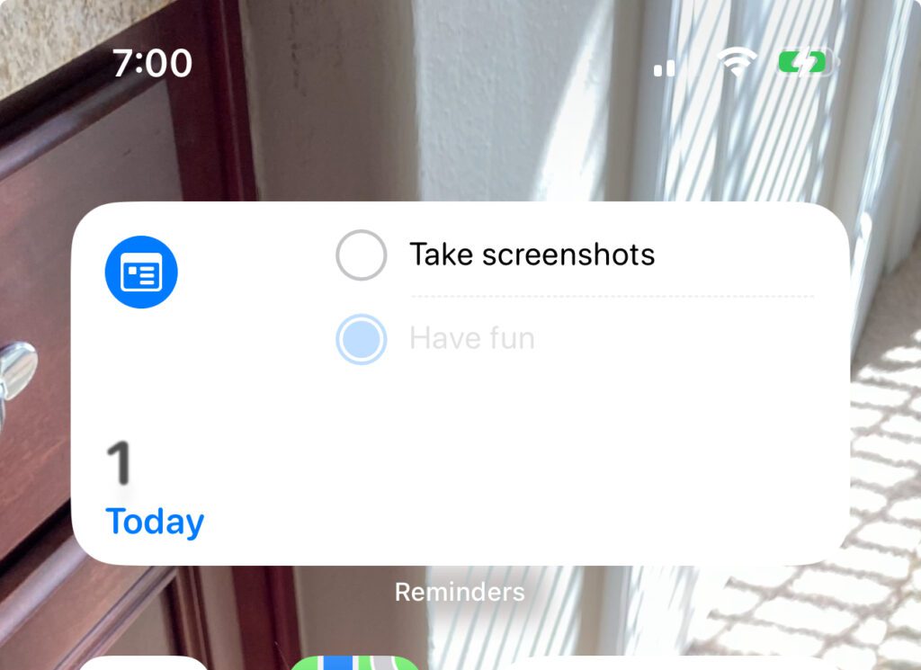 My 8 Favorite iOS 17 Features 5 checking off reminders in the new interactive widgets on iOS 17