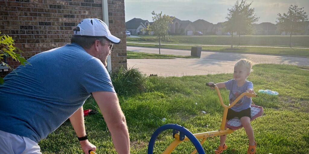 5 Things I’ve Learned as a Stay-at-Home Parent So Far 7 A dad and son playing on a seesaw