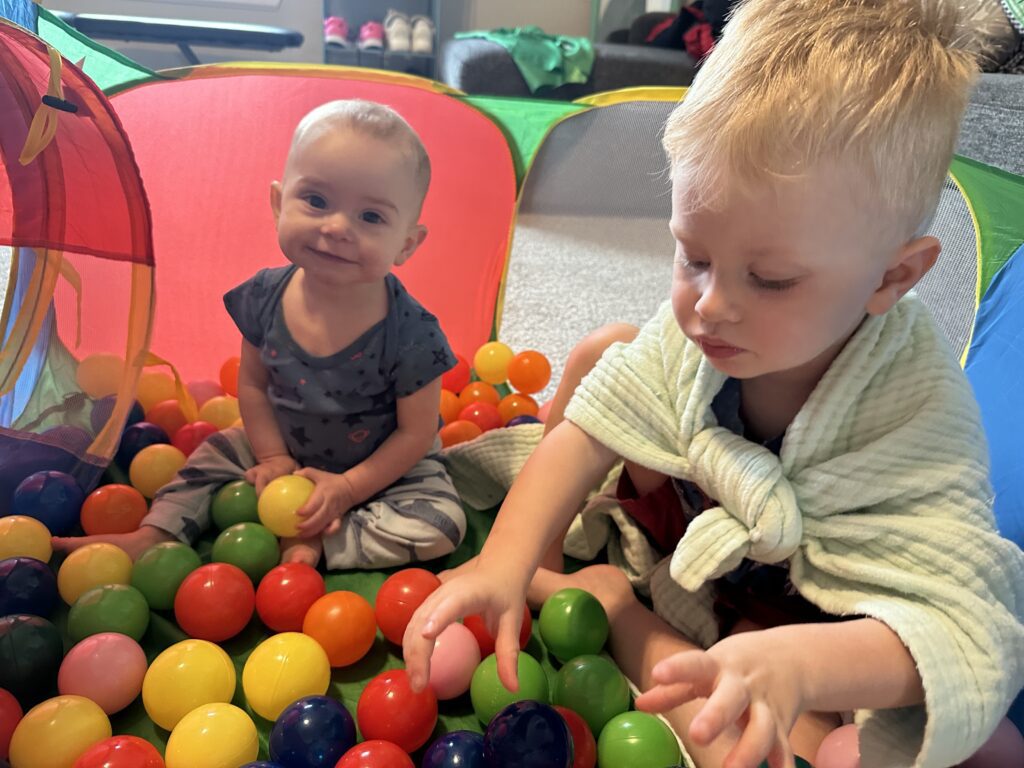 The Daily Routine of This Stay-at-Home Dad 4 Two boys playing in a colorful ball pit