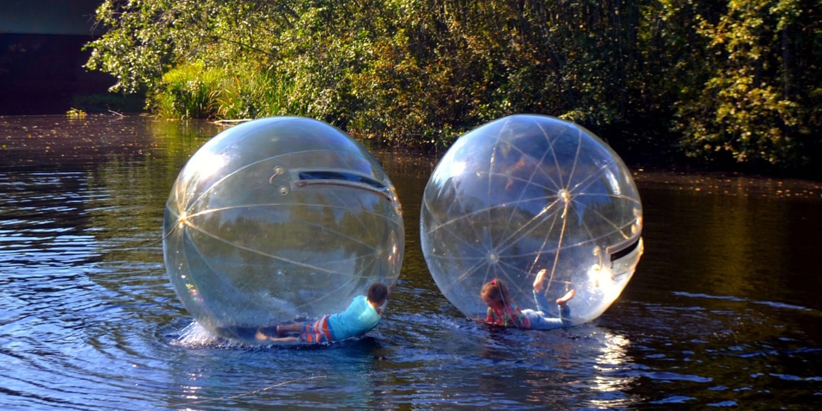 two floating balls with kids inside them representing my coming vasectomy