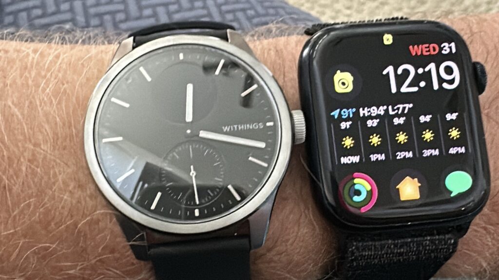 Withings ScanWatch Vitals: A Potential Competitor to the Apple Watch 3 Withings ScanWatch Vital and Apple Watch Series 8 on an arm