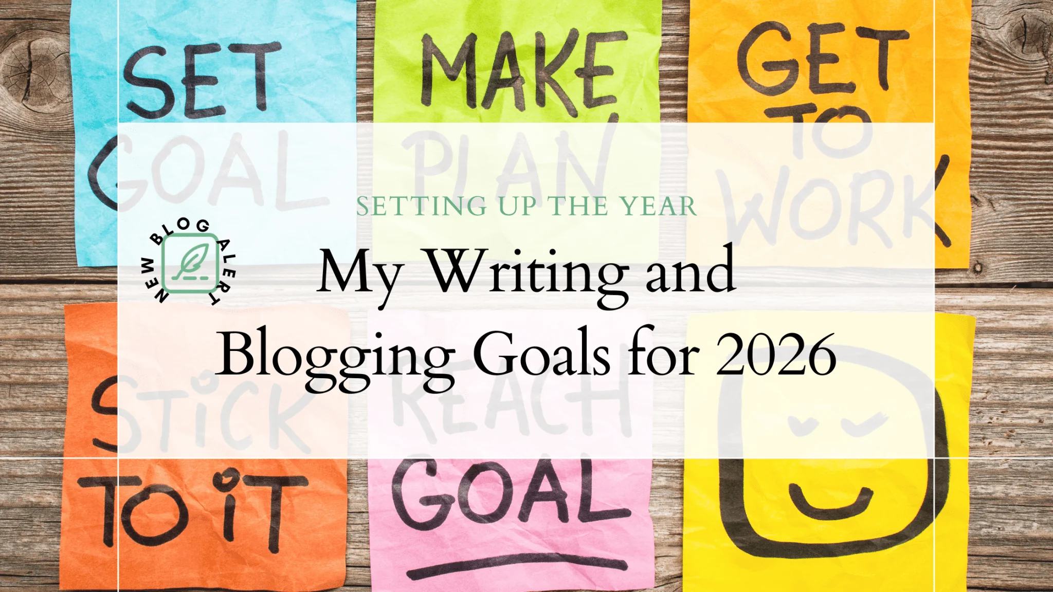 A collage of colorful sticky notes with motivational words on a wooden surface. The words include "SET GOAL," "MAKE A PLAN," "GET TO WORK," "STICK TO IT," and "GOAL." In the center, there is a white rectangular overlay with the text "My Writing Goals for 2026" and a logo that reads "The Blogaler" with a leaf design.
