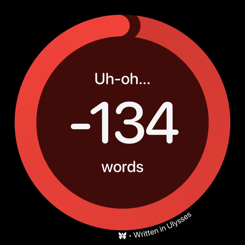 How To Set Goals In Ulysses 4 A circular progress ring on a dark background, showing a negative word count. The text inside the ring reads "Uh-oh... -134 words," and the bottom of the ring features a butterfly icon next to the text "Written in Ulysses.